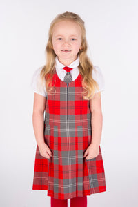 pleated red and grey pinafore dress for primary schools across Scotland