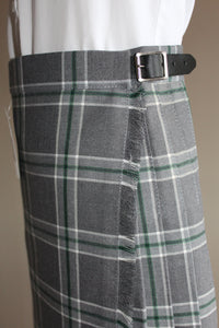 grey and green tartan school kilt with buckle and adjustable waist band
